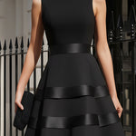 Elegant black sleeveless tiered midi evening dress