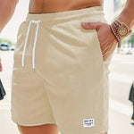 KZZ Men's Letter Patchwork Print Pocket Shorts