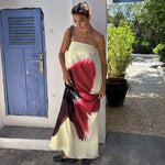 Liora | Robe longue bustier à dos nu avec imprimé fleuri