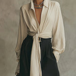 Beige lace-up shirt and black trousers set