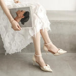 Rosette Bow Pumps