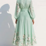 Cisella | Robe midi verte claire à fleurs