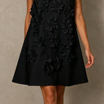 Black Sleeveless Mini Dress Featuring Striking Floral And Bow Details