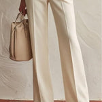 Elegant high-neck top with 3D floral hem and trousers set
