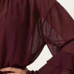 Alma sheer top with mock high neck