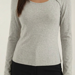Long-sleeved knit top with Barbara-style slits